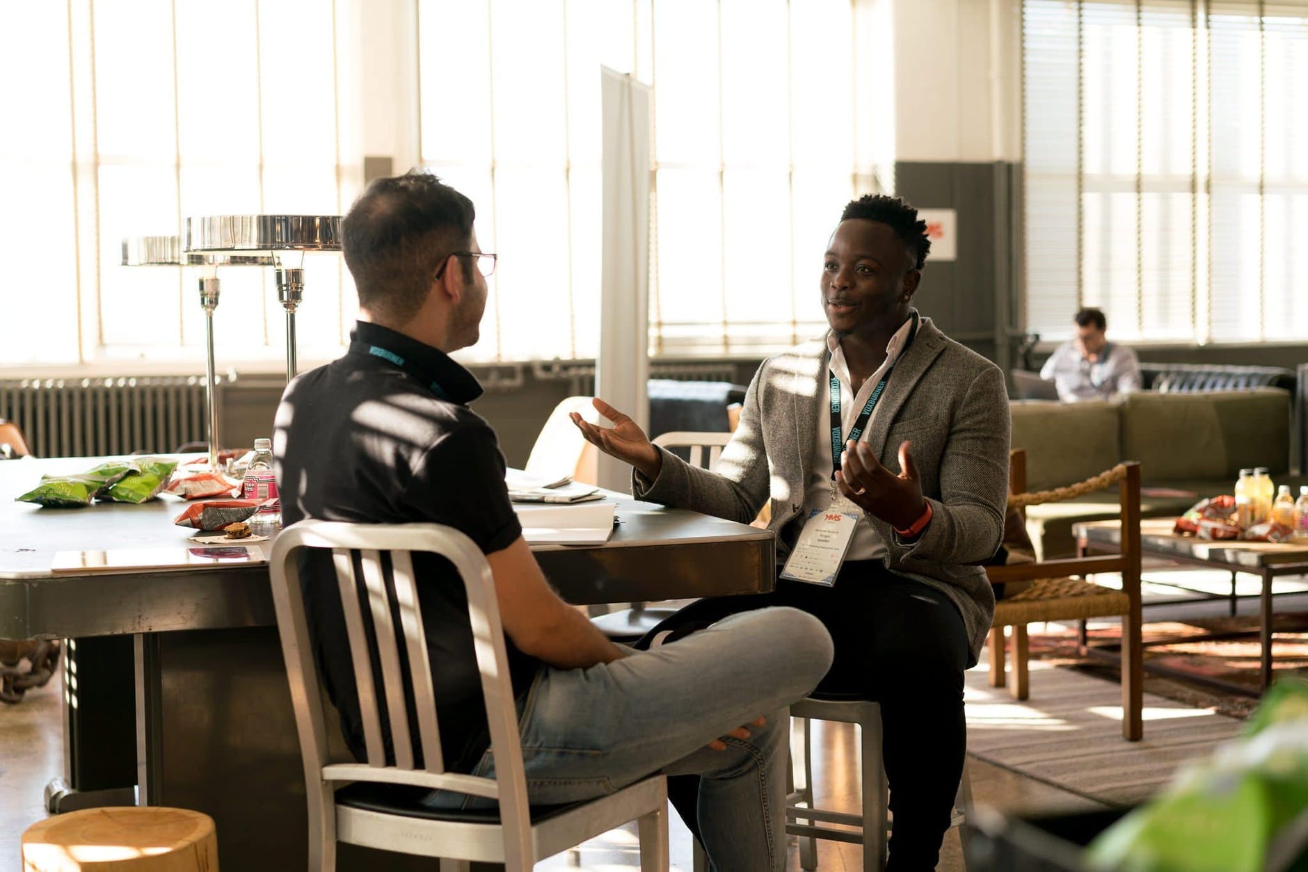 photo of men having conversation